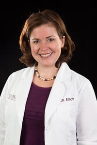 Dr. Audrey Eliott - Dentist, smiling at the camera