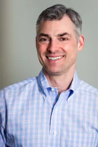 Dr. Doug Elliot - Orthodontist, smiling at the camera